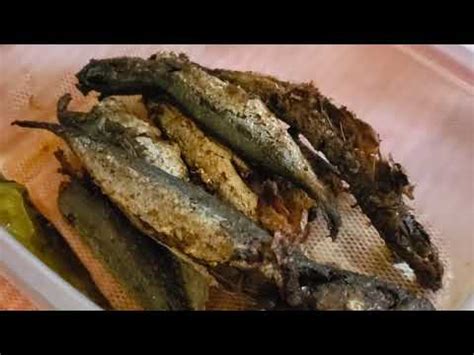 FRYING THE FISH ( tamodios) after cooking with vinegar and .